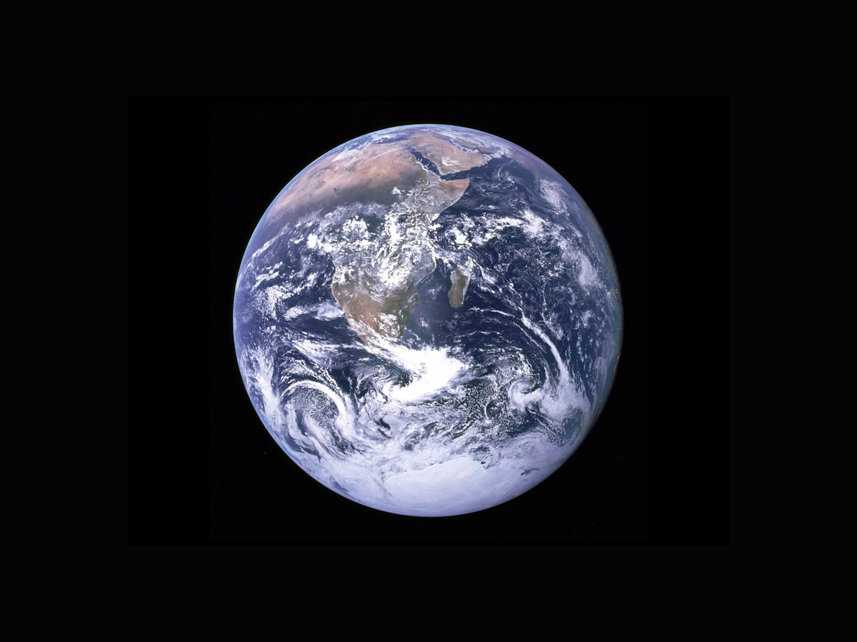 Earth seen from deep space, the African continent under white cloud against black